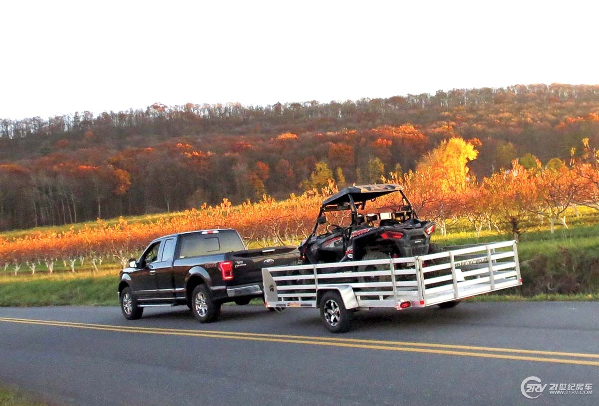 vendor.2017.bear-track.trailer.hauling-utv.on-road.jpg